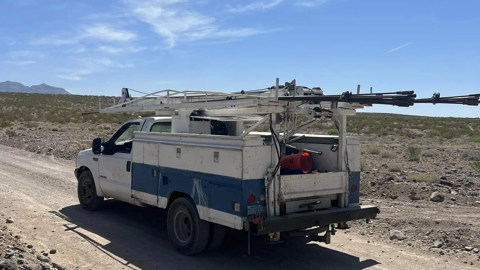 Well service truck on a desert road on the way to a pump job
